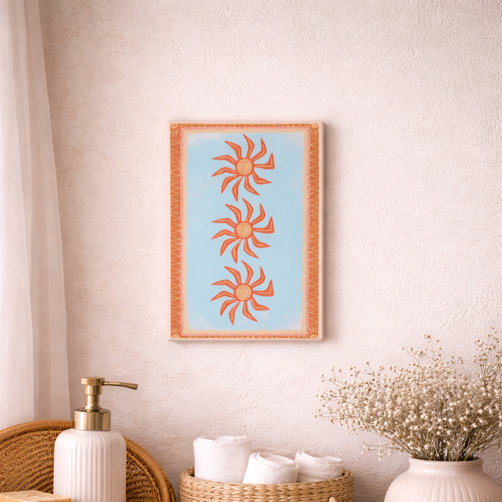 Nautical-themed decor with a framed sun design, baskets, and starfish on a wooden surface.